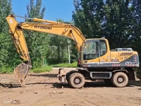Second hand wheeled HYUNDAI 210W-9 excavators